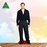 Man wearing a black outfit with 'Australian Made' logo on a colorful background